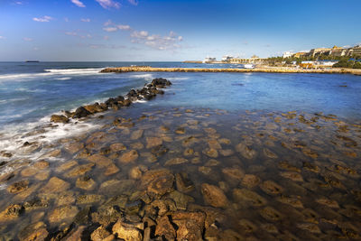 Scenic view of beach against sky