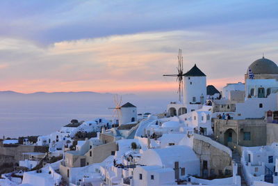 Scenic view of landscape against sky at sunset