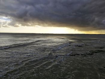 Scenic view of sea against sky during sunset