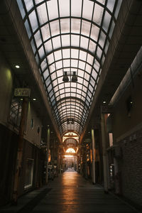 Illuminated corridor of building