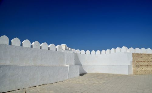 Exterior of historic building against clear blue sky