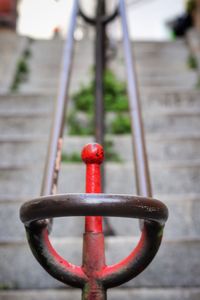 Close-up of metal railing against blurred background