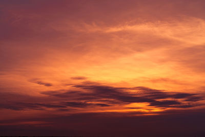 Low angle view of dramatic sky during sunset