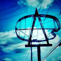 Low angle view of building against blue sky