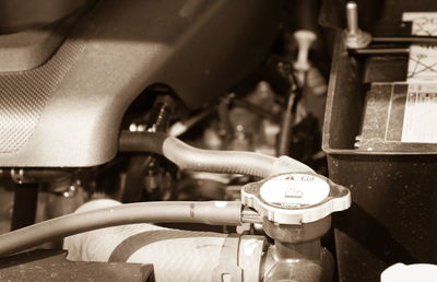 Close-up of hand working on motorcycle