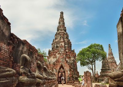 Low angle view of historic built structure against blue sky