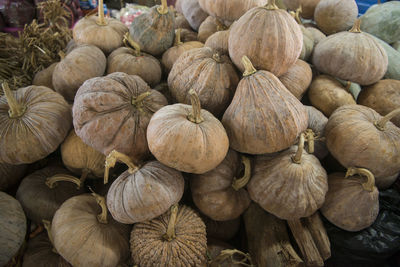 High angle view of squashes on table for sale at market