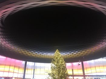 Low angle view of illuminated ceiling