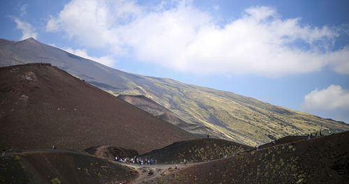 Panoramic view of road amidst mountains against sky