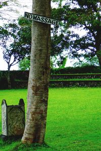 Information sign on grassy field