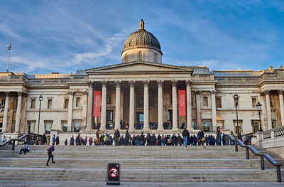 Group of people in front of building