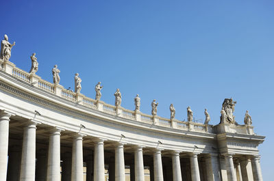 Low angle view of statue against sky