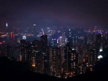 Illuminated cityscape at night