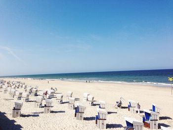 Changing cubicles on sandy beach