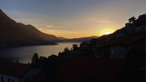 Scenic view of lake against sky during sunset