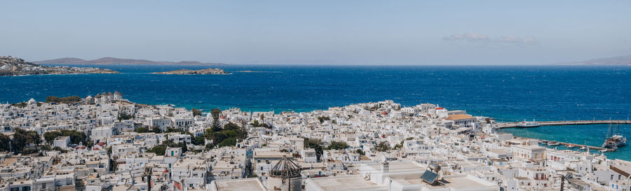 High angle panoramic view of mykonos town, mykonos, greece, on a sunny summer day.