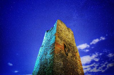 Low angle view of castle against blue sky