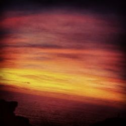 Scenic view of dramatic sky during sunset