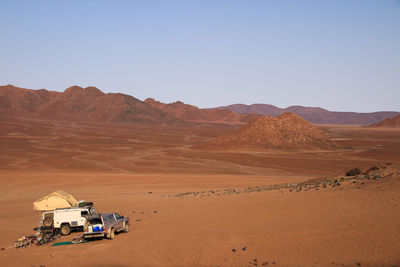 Scenic view of desert against clear sky