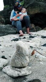 Full length of boys on shore