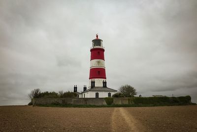 Low angle view of lighthouse against sky