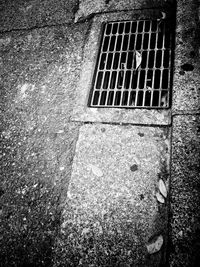 Close-up of manhole on window