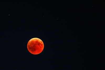 Scenic view of moon against sky at night