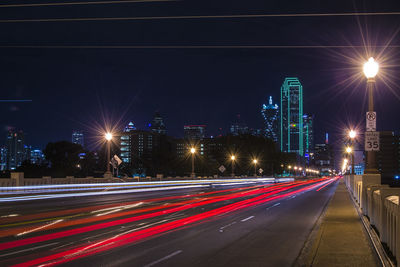 Light trails on road at night