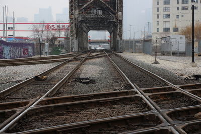 Railway tracks against buildings
