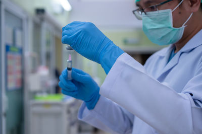 Midsection of woman working