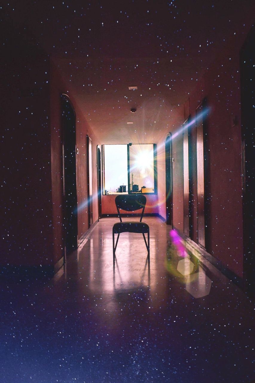 architecture, indoors, built structure, reflection, seat, no people, illuminated, building, empty, nature, window, night, absence, chair, sky, water, domestic room, flooring, purple