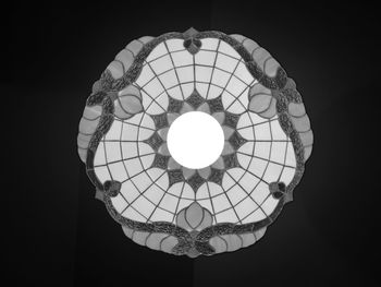 Low angle view of illuminated chandelier