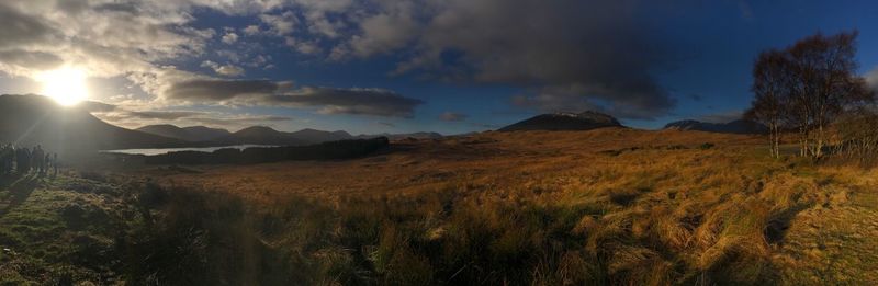 Scenic view of mountains against dramatic sky