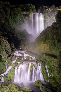 View of waterfall in forest