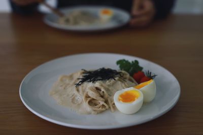 Close-up of meal served in plate on table