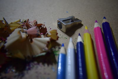 High angle view of multi colored pencils on table
