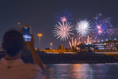 Firework display at night