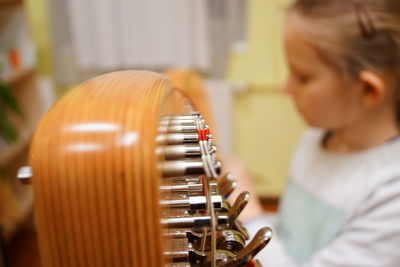 Girl playing harp