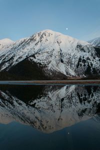 Scenic view of snow covered mountains