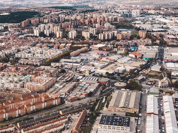 High angle view of street amidst buildings in city