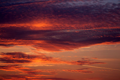 Low angle view of dramatic sky during sunset