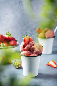 Close-up of fruits served in bowl on table