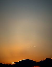 Silhouette of mountain at sunset