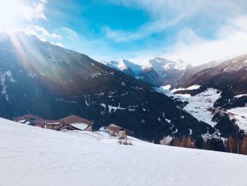 Scenic view of snowcapped mountains against sky