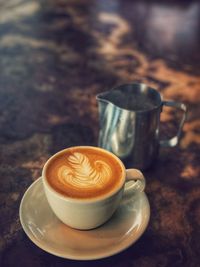 Coffee cup on table