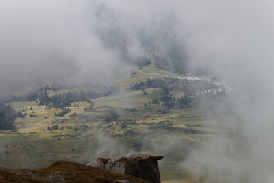 Smoke emitting from volcanic mountain against sky