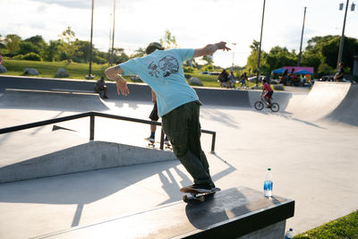 Man skateboarding on skateboard park