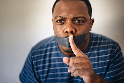 Close-up of man holding apple