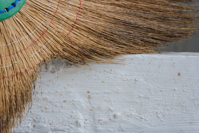 Close-up of broom on steps