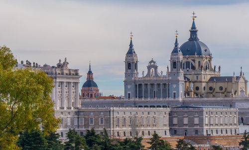 View of buildings in city against sky